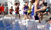 Promedio reparte agua del grifo a 3500 participantes de carreras deportivas